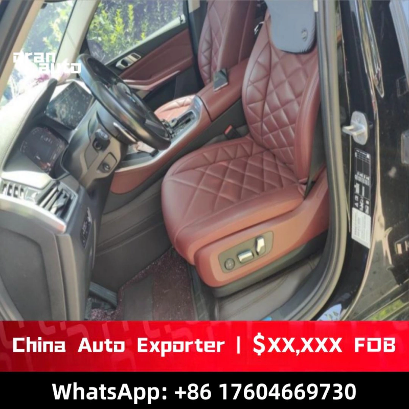 BMW X5 luxury SUV cockpit dashboard interior technology view